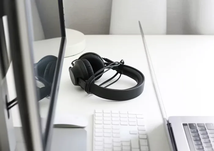 Aurora wireless headphones on a white desk