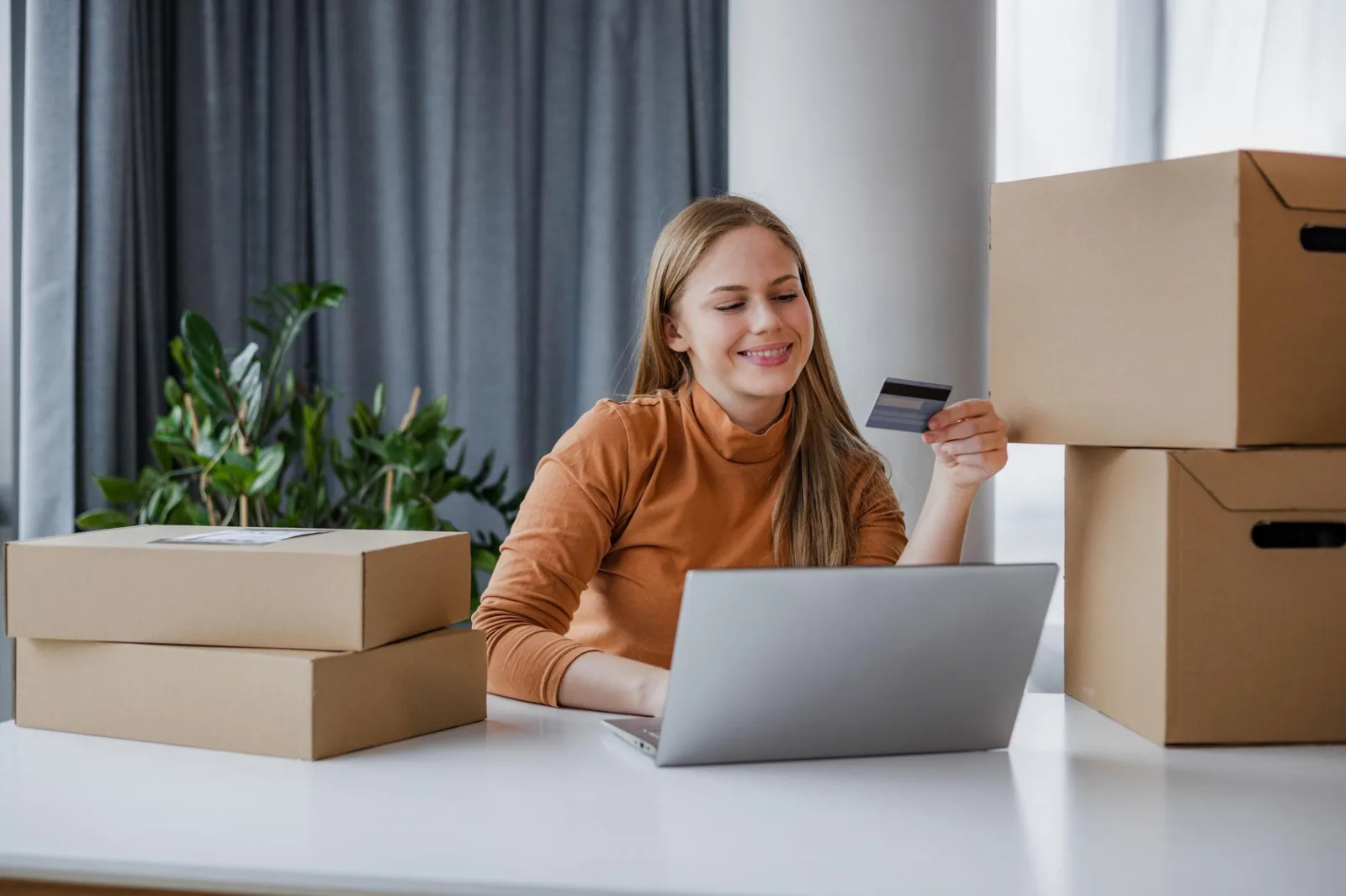 Laptop showing online shopping and checkout page